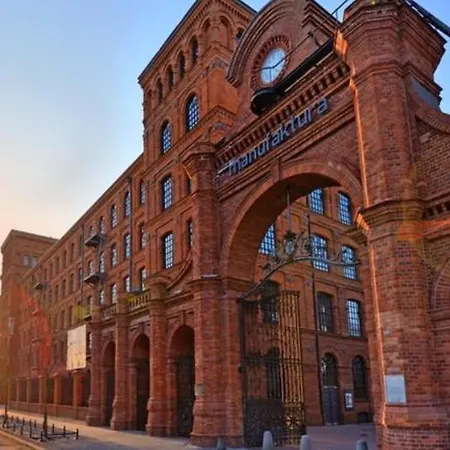Brick & Center Manufaktura Lägenhet
